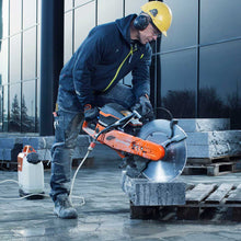 Load image into Gallery viewer, Husqvarna Power Cutter K970 using diamond blade to cut material